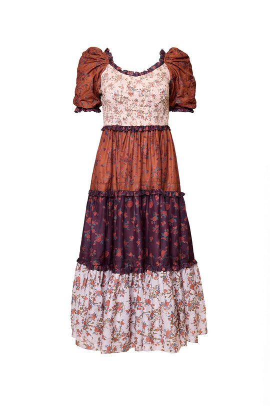 Multicolored dress with floral patterns on a white background