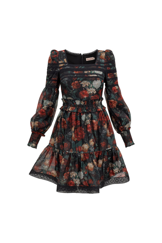 Floral patterned dress with long sleeves on a white background