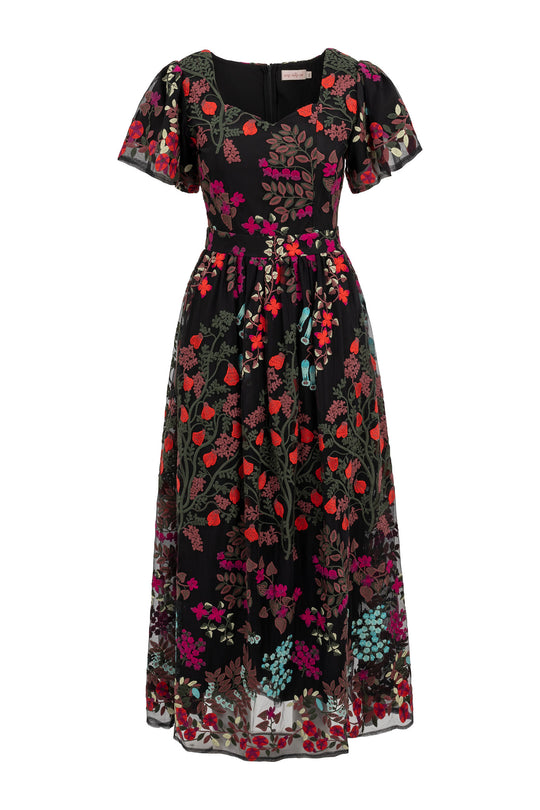 Floral patterned dress on a white background