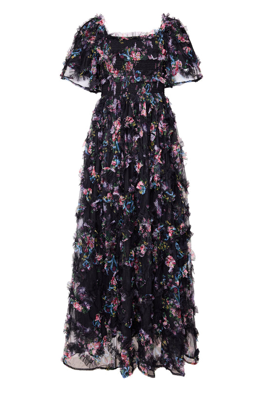 black ruffled floral dress against a white background