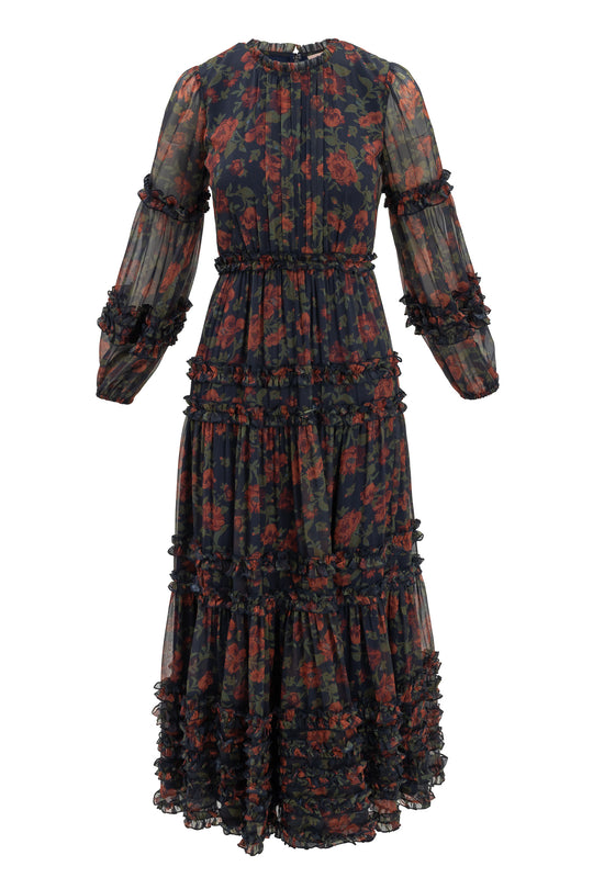 Long floral dress with ruffled sleeves and bottom on a white background