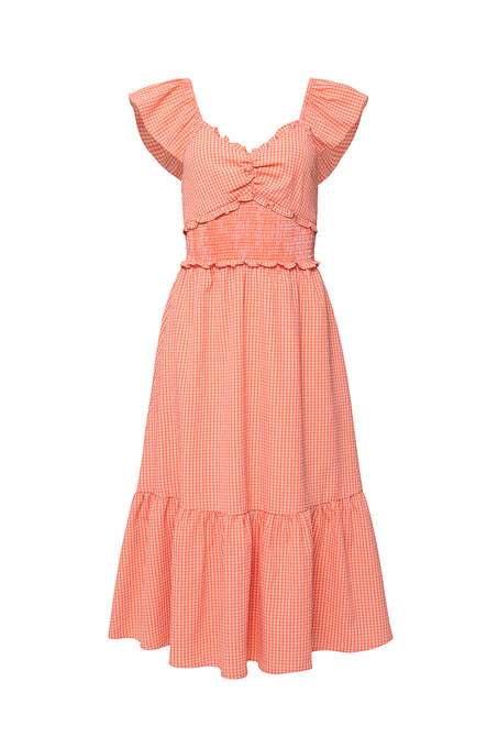 The Gidget Dress in Orange Gingham by Ivy City Co is a sleeveless, knee-length nursing-friendly dress with ruffled cap sleeves, a ruched bodice, and a flared tiered skirt.