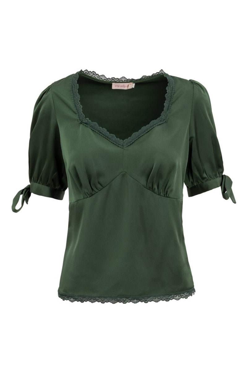 Dark green Ivy City Co Ariella Blouse in Green with a lace-trimmed neckline, puffed sleeves with tie cuffs, and a lace hem.