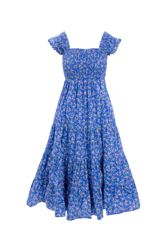 The Hailey Dress in Allie Blue Floral by Ivy City Co features ruffled sleeves, a smocked bodice, flowing tiered skirt, and off-shoulder design. This maternity-friendly dress offers effortless style with its blue floral print.