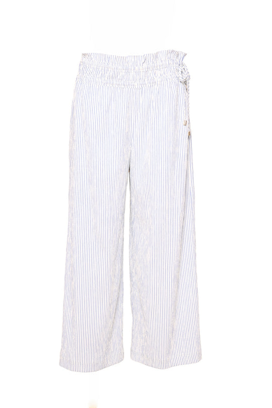The Harley Pants in Blue & White Pinstripe by Ivy City Co feature a wide-leg silhouette, elastic ruffled waistband, maternity-friendly design, and decorative side tie. Shown on a plain white background.