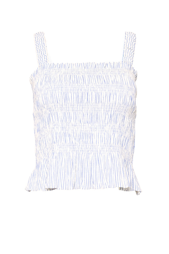The Ivy City Co Harley Top in Blue & White Pinstripe is a smocked sleeveless style with wide straps and a ruffled hem for a playful touch.