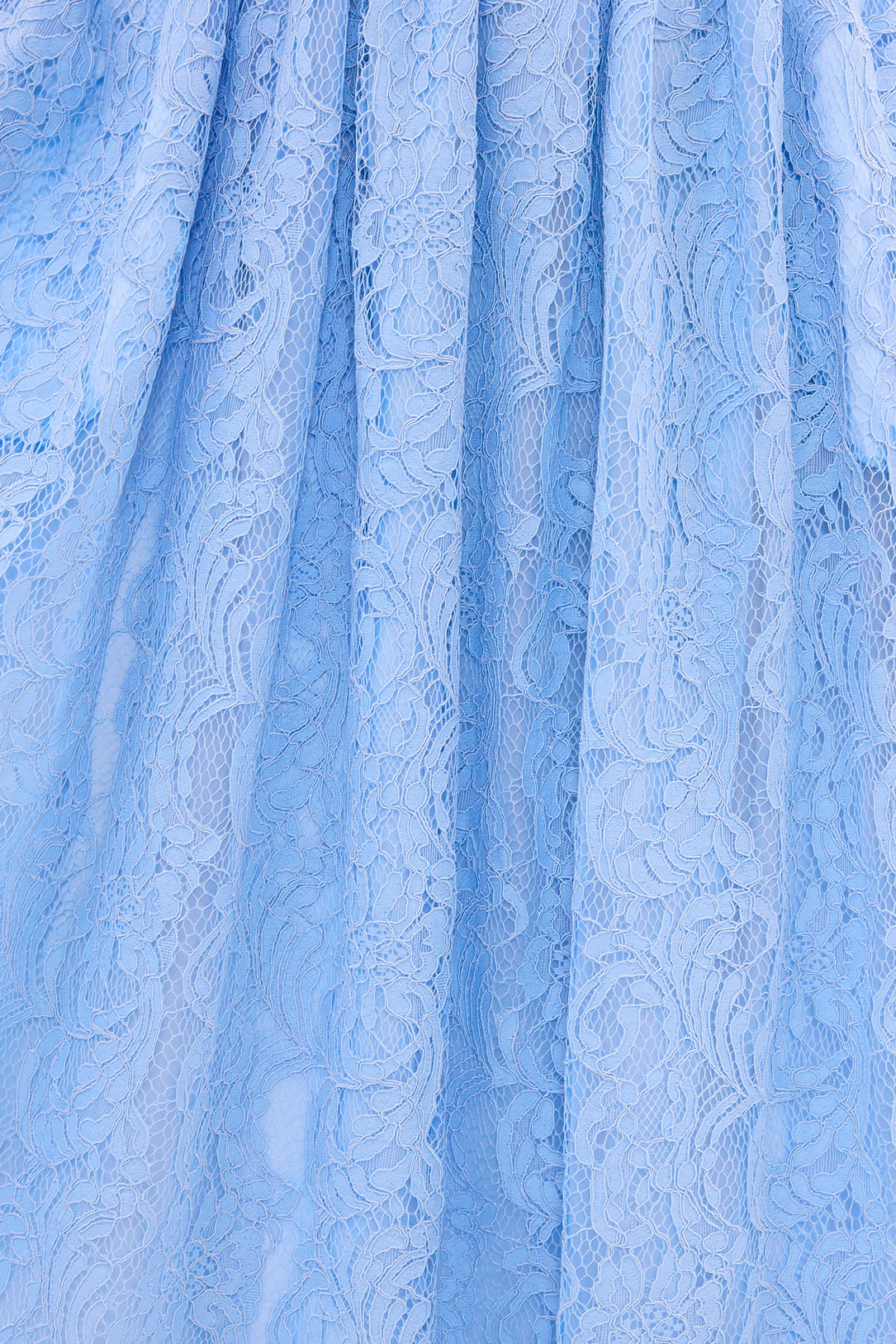 Close-up of light blue fabric with a subtle pattern