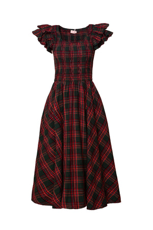 green dress, with red plaid pattern on a white background