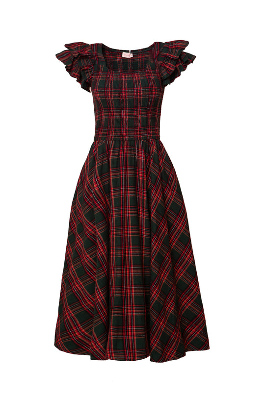 green dress, with red plaid pattern on a white background