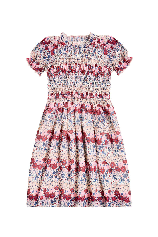 Floral dress with red and blue pattern on a white background