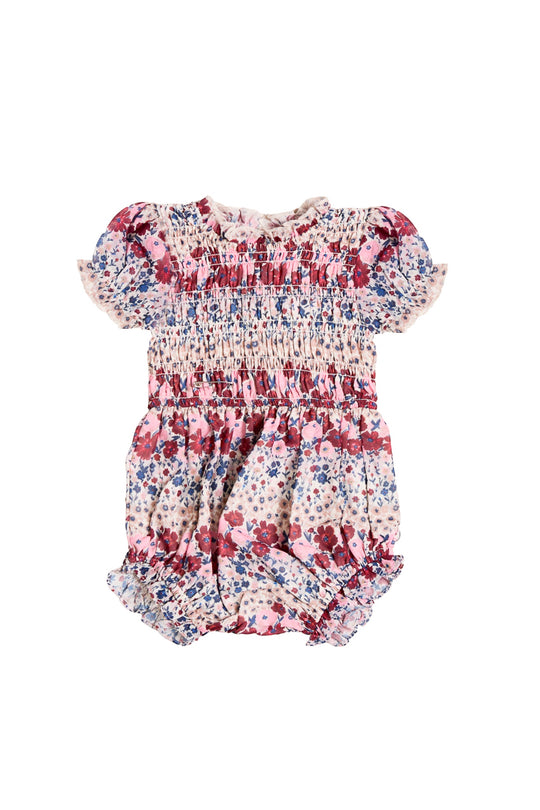 Floral baby romper on a white background
