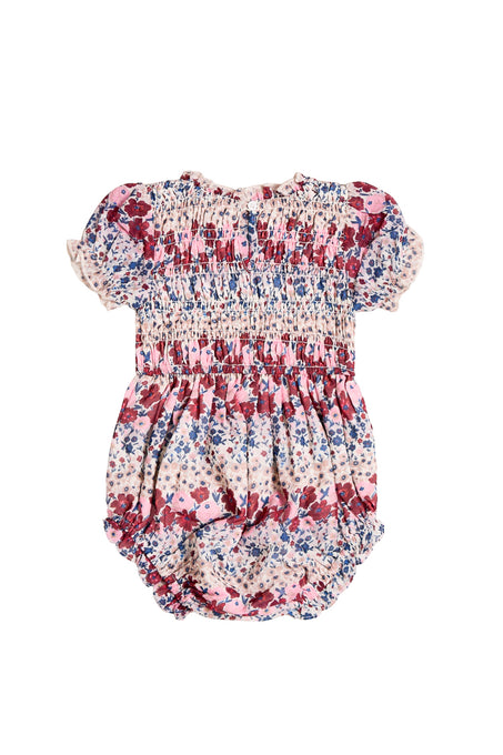 Floral baby romper on a white background