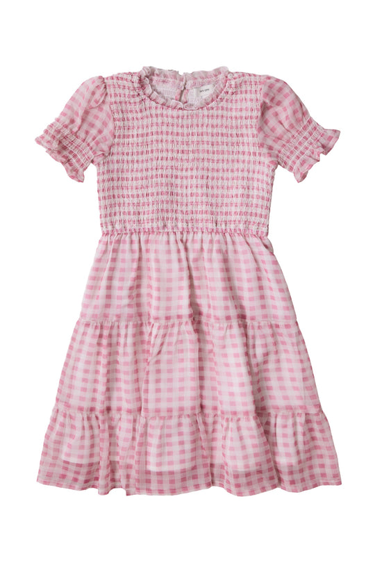 The Ivy City Co Mini Cordelia Dress in Desert Rose Gingham is a delightful girls’ spring dress, showcasing pink and white gingham fabric with short puffed sleeves, a smocked bodice, tiered skirt, and ruffled neckline, set against a white background.