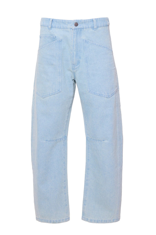 The Amanda Pants in Light Wash Denim by Ivy City Co feature a wide-leg silhouette in a light blue hue, crafted from light wash denim with large front pockets and a button closure, shown against a white background.