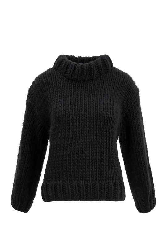 Black knitted sweater on a white background