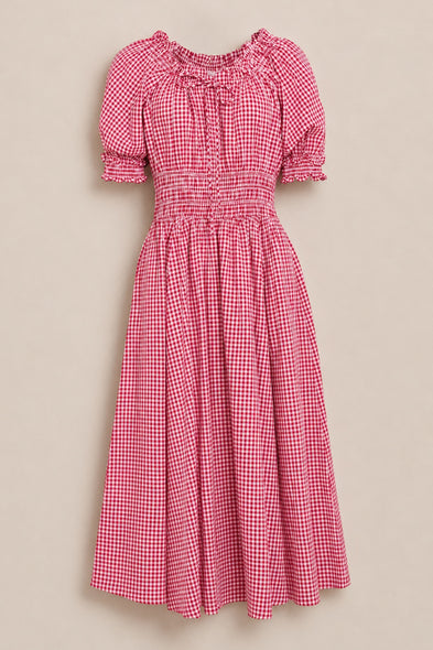 The Jessie Dress in Red Gingham by Ivy City Co features a smocked bodice, short puff sleeves, ruffled neckline, and elastic waist—maternity and nursing friendly—displayed against a neutral background.