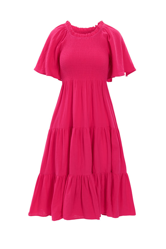 The Jovie Midi Dress in Hot Pink by Ivy City Co features a cotton fabric, short flutter sleeves, smocked bodice, tiered skirt, and relaxed fit—making it a stylish maternity option with feminine flair.