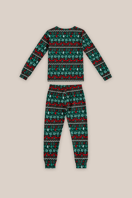 The Kids So Soft Pajama Set in Alpine Noel by Ivy City Co features a festive green, red, black, and white Christmas pattern—perfect for cozy family matching this holiday season.