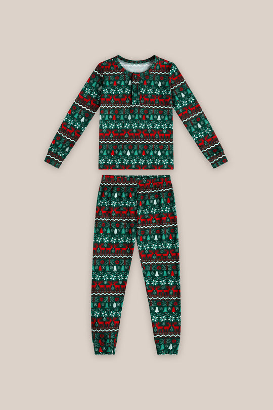The Kids So Soft Pajama Set in Alpine Noel by Ivy City Co features festive green, red, and white patterns—ideal for holiday photos or matching family pajamas.