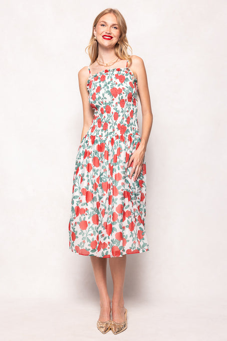 Woman wearing a floral dress on a white background