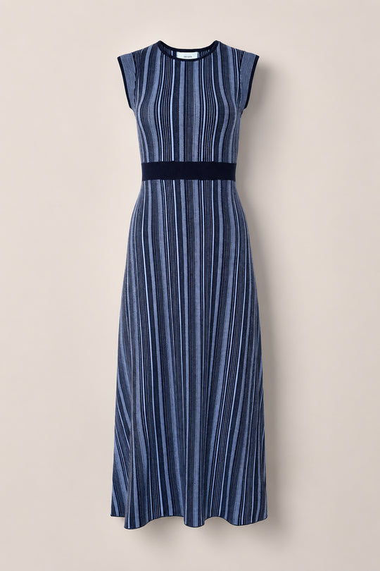 The Laurel Dress in Midnight by Ivy City Co is a sleeveless, ankle-length style featuring vertical blue and navy stripes, a fitted bodice, and a defined waistband for a flattering silhouette. Shown against a light beige background, this dress delivers effortless sophistication and is maternity friendly—perfect for any occasion.
