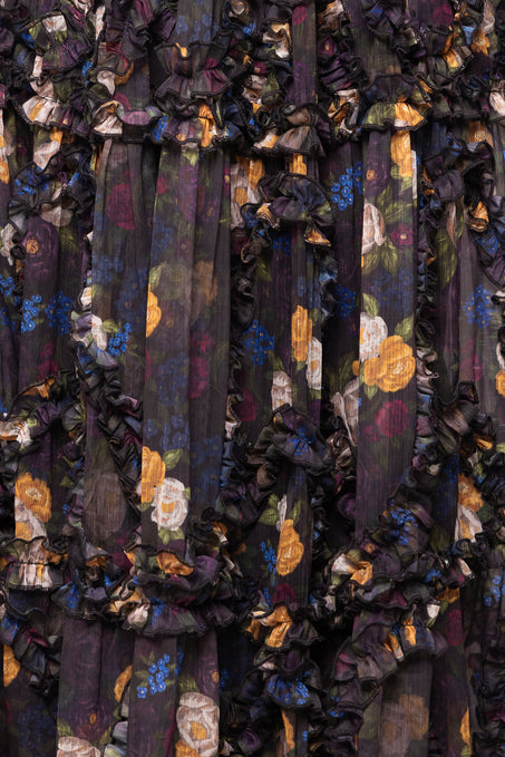 Close-up of a floral patterned fabric with dark background