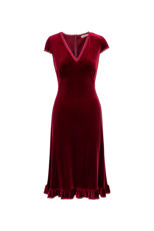 Red velvet dress on a white background