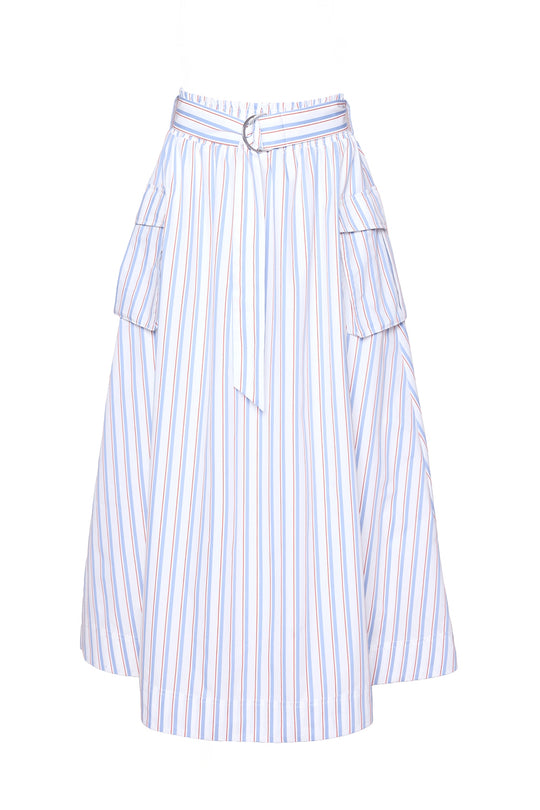 The Lizzy Skirt in Heritage Stripe by Ivy City Co is a knee-length A-line summer skirt with blue, red, and white vertical stripes, large side pockets, and a matching belted waist with a silver buckle.