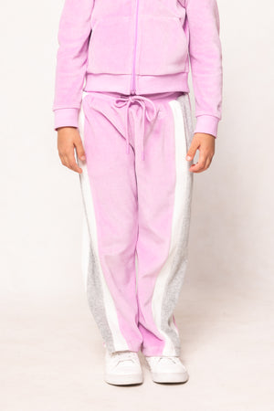 Pink tracksuit with white stripes on a plain background