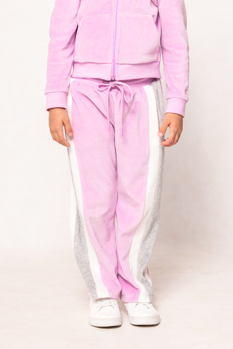 Pink tracksuit with white stripes on a plain background