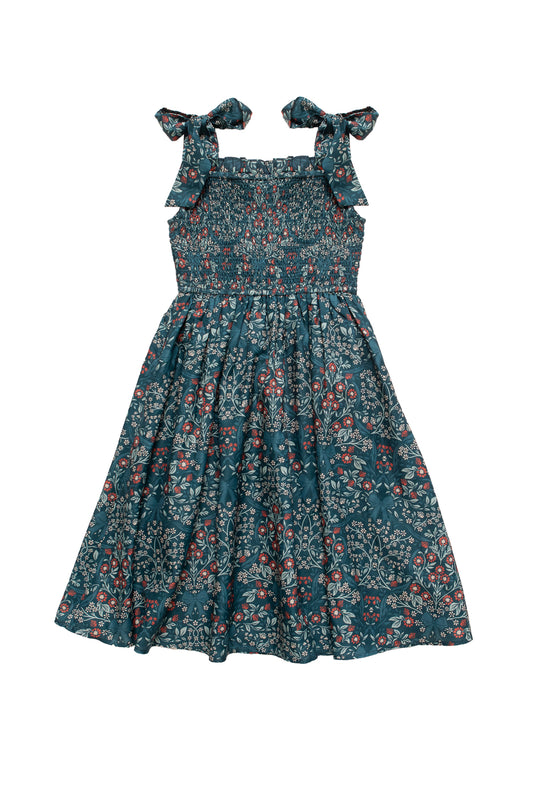 Floral dress with bow straps on a white background