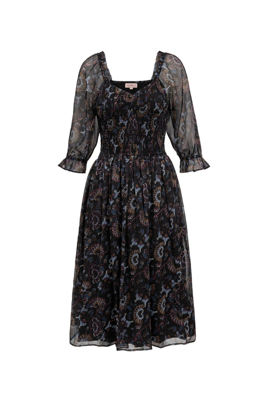 Black floral patterned dress on a white background