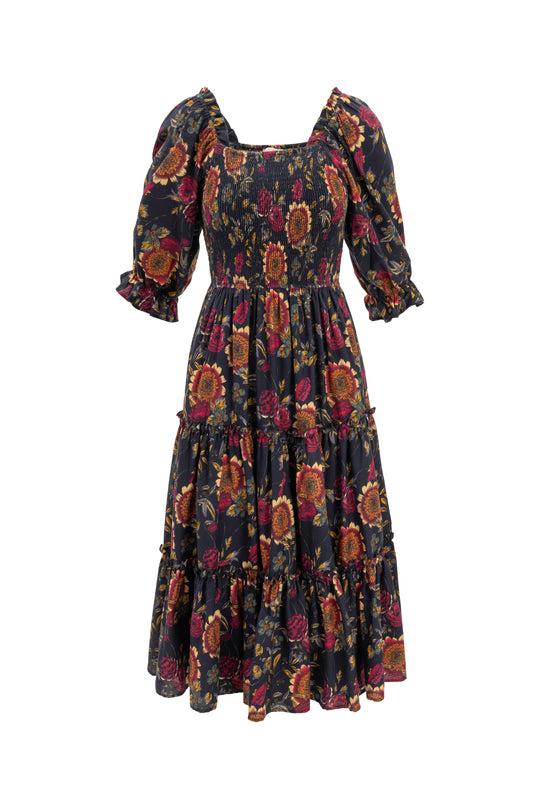 Floral patterned dress with puff sleeves on a white background