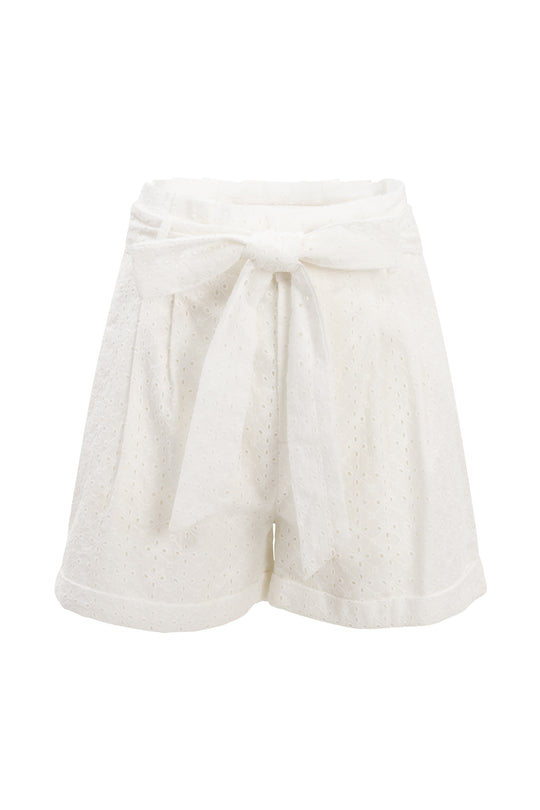 The Maria Shorts in White Eyelet by Ivy City Co feature a removable tie belt, pleated front, and rolled hems, shown against a plain background.