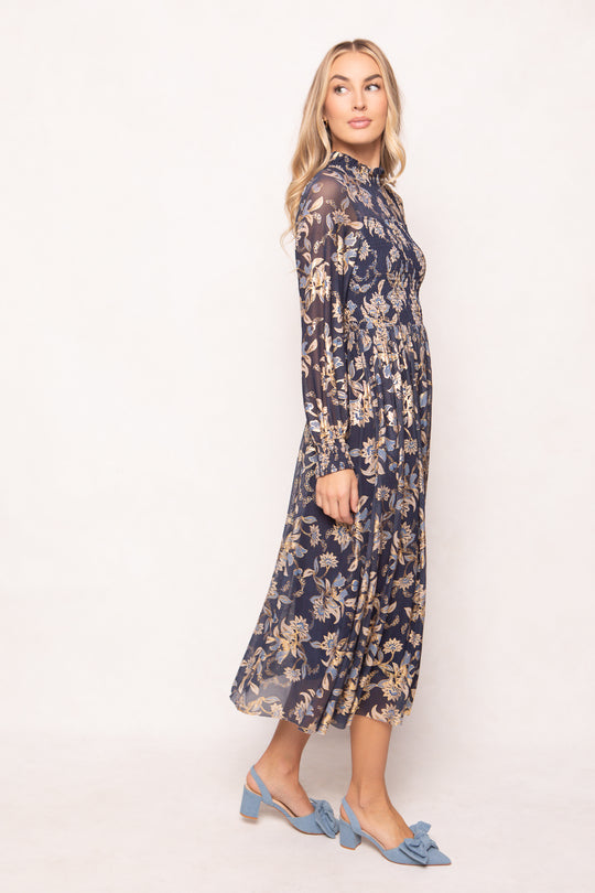 Woman wearing a floral dress on a white background