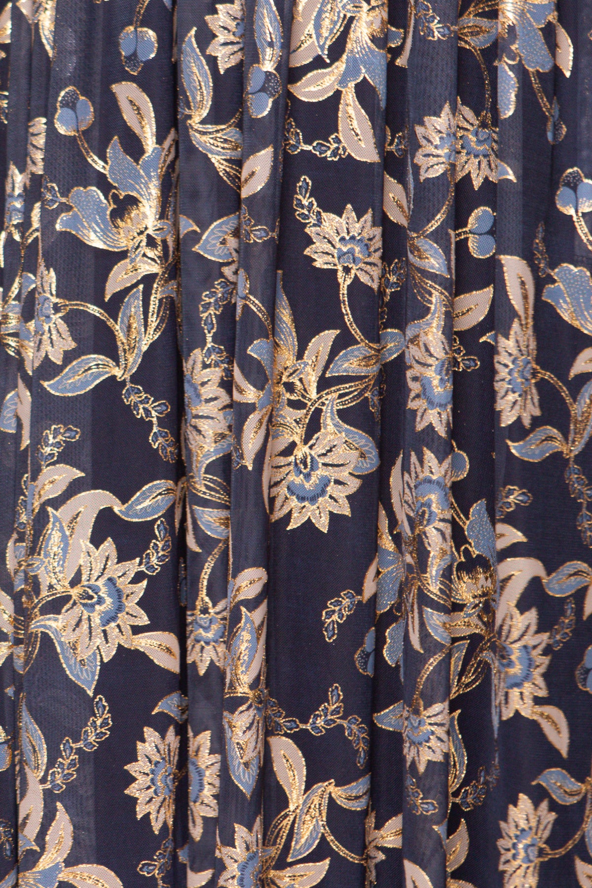 Navy blue fabric with gold and white floral pattern