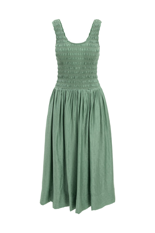 The Ivy City Co Marlow Dress in Green is a maternity-friendly midi dress with a smocked bodice and a gathered, flowy skirt, shown on a white background.