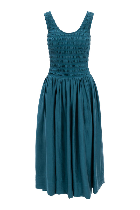 Teal dress with smocked bodice on a white background