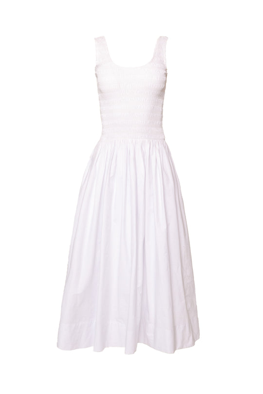 The Marlow Dress in White by Ivy City Co is a sleeveless cotton midi dress with a fitted smocked bodice, wide neckline, and full gathered skirt. Maternity friendly and shown on a plain white background.