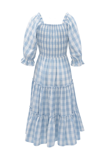 The Mia Gingham Dress in Blue by Ivy City Co features light blue and white checks, puffed half sleeves, a smocked bodice, tiered ruffle skirt, and square neckline—perfect for a comfortable, summery maternity look.