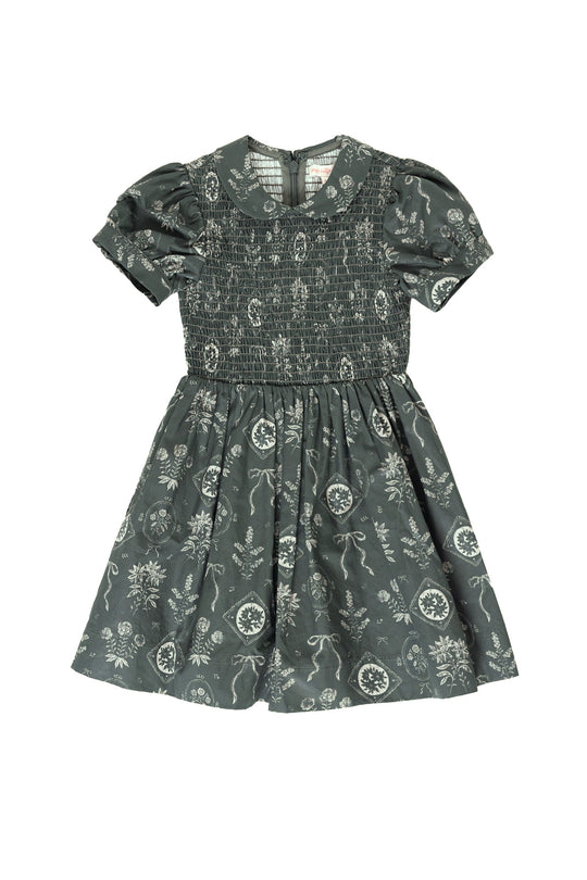 Green dress against a white background