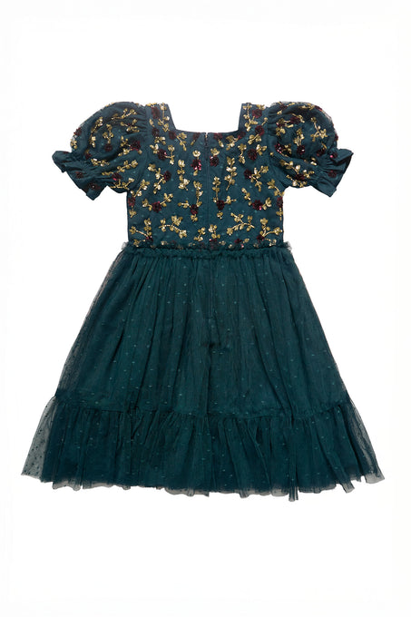 Teal dress with floral embroidery on a white background