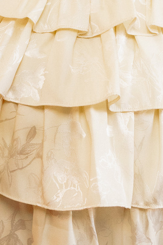Close up shot of a white ruffle dress