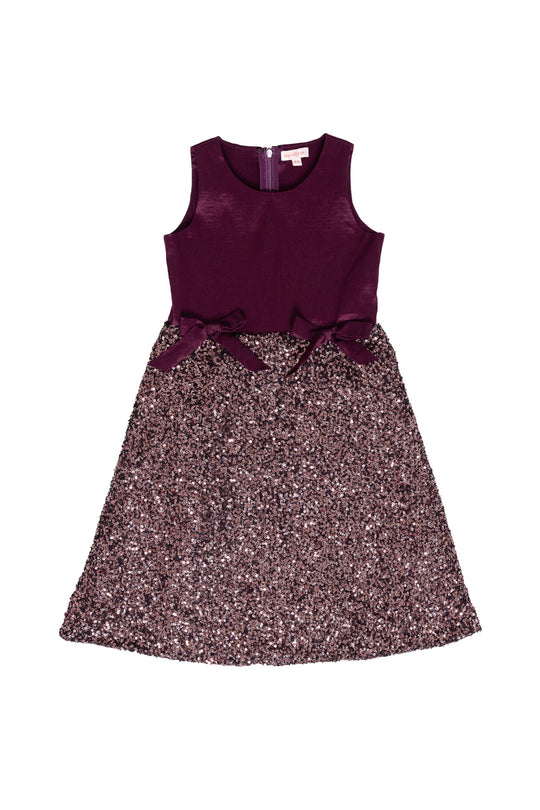Purple dress with a glittery skirt on a white background
