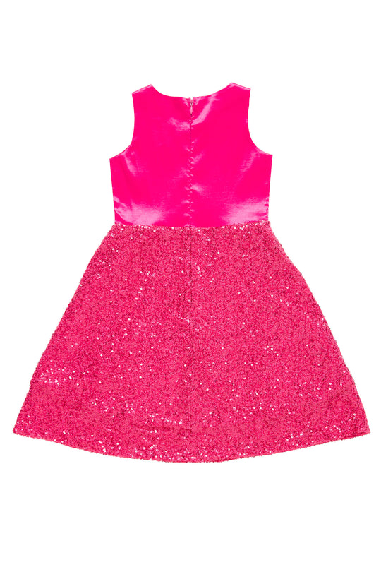 Pink dress with glittery skirt on a white background