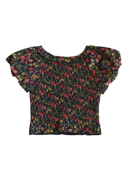 The Mini Annalise Top in Obsidian Vintage Poppies by Ivy City Co features a smocked bodice, loose ruffled sleeves, and a wide round neckline—ideal for Mom and Me matching outfits. Navy blue with vintage poppy print.
