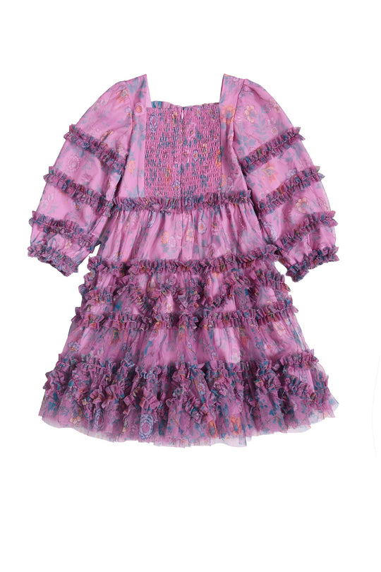 the back of purple floral childrens dress against a white background