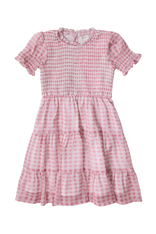 The Ivy City Co Mini Cordelia Dress in Desert Rose Gingham features pink and white checks, short puffed sleeves, a smocked bodice, ruffled neckline, and tiered skirt—perfect as a girls' spring dress.