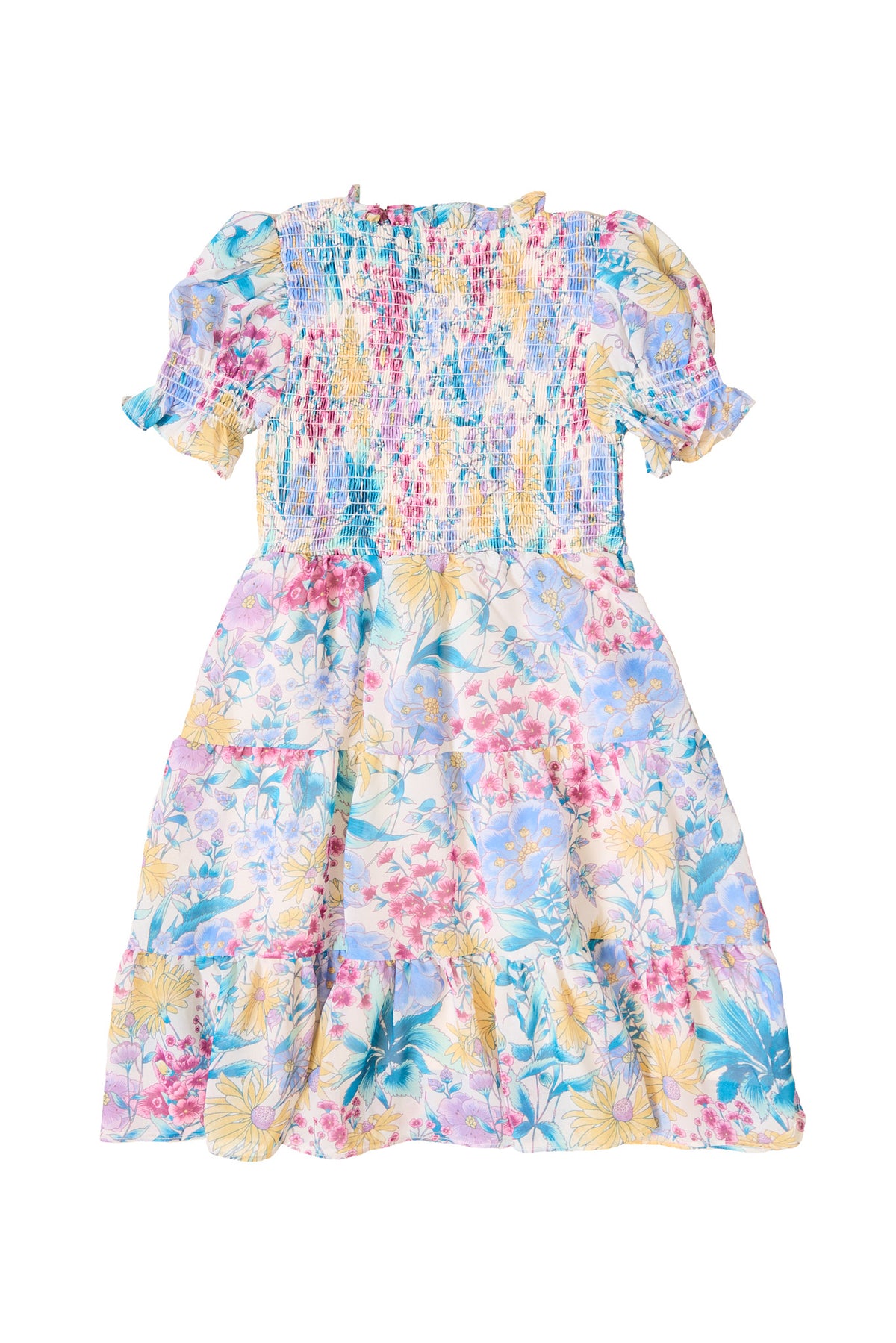 the back of a girls floral dress against a white background