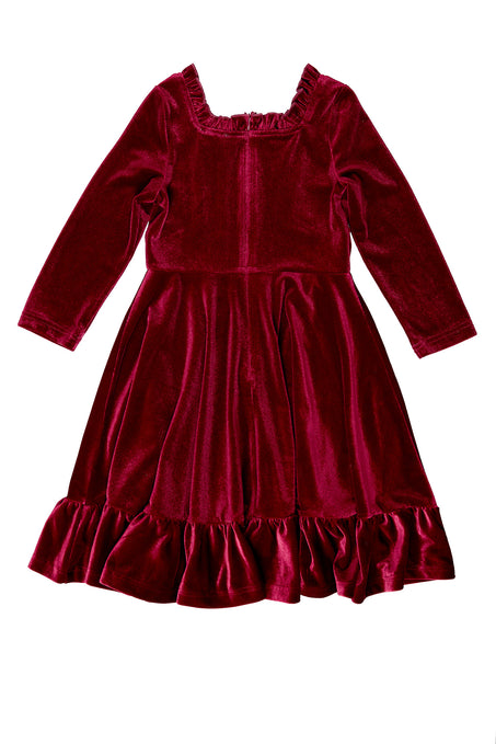 red velvet dress against white background